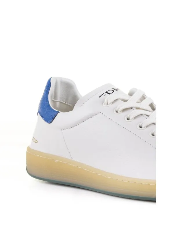 White leather sneaker and blue heel